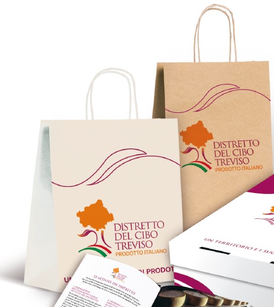 packaging del distretto del cibo con due borse di carta in cui è stampato il logo
